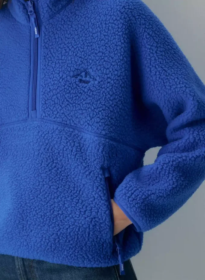 Polartec® Thermal Pro™ genser med 1/2 glidelås og høy hofte